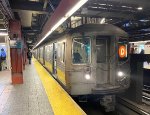 D train of R68 Cars at 34th St-Herald Square Station 